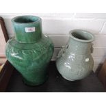 An early 20th century earthware bulbous jar having green glaze and a 20th century Chinese celadon