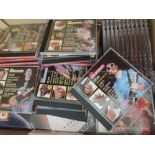 A box of 'Play Guitar' CD's - listen - practice - play