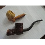 A novelty meersham pipe modelled as 'Play Up' football and leg, and a novelty pipe modelled as a