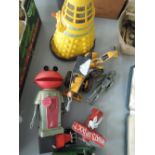 A selection of vintage toys, including Dalek's, Smash TV robot, Bugs Bunny plane, etc