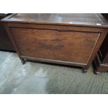 A mid 20th century oak bedding box