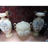 A pair of Truscan ware vases and a similar planter