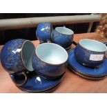 A set of Denby cups and saucers