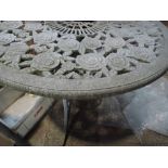 A modern cast alluminium garden table