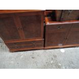 Two modern yew wood entertainment  cabinets