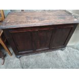 A mid 20th century oak bedding box