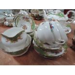 A part tea service by Paragon cream with floral design