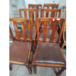 A set of six mid 20th century stained frame dining chairs