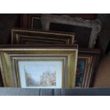 A box of various pictures and prints