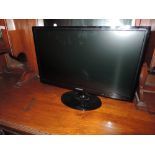 A Samsung 24" flat screen TV and stand