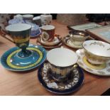 A selection of cups and saucers including Aynsley and Royal Worcester