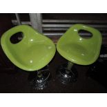 A pair of modern breakfast bar stools