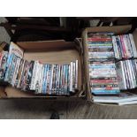 Two boxes of DVDs