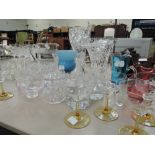 A selection of glassware including cut glass, cranberry and coloured etc