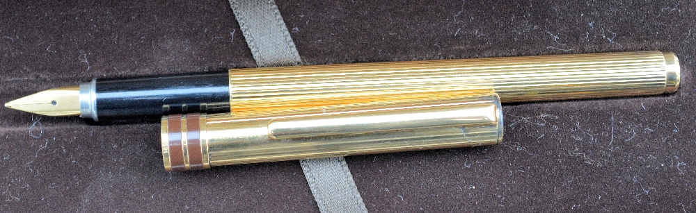 An Aurora sterling silver / gilt fountain pen