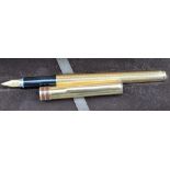 An Aurora sterling silver / gilt fountain pen