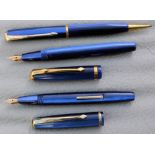 Two Conway Stewart Dinkie Fountain pens and matching pencil