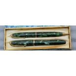 A Conway Stewart green dinky 550 Fountain pen and pencil