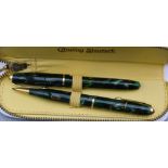 A Conway stewart green dinky 550 Fountain pen and pencil