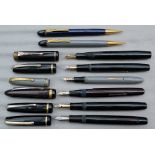 Six Burnham Fountain pens and two pencils