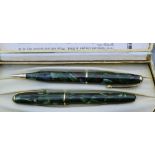 A Conway stewart green dinky 550 Fountain pen and pencil