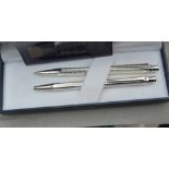 A Caran D'Ache silver plated Ballpoint and pencil set