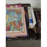 A box of jigsaw puzzles