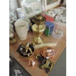 A collection of decorative brass and copper including oil lamp