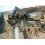 A selection of vintage carpentry tools including Tenon saws and squares etc