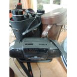 A pair of Boots Pacer binoculars 8x30mm and a Hifisonic portable radio