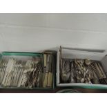 Two boxes of flatware