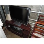 A Toshiba TV, digi box etc including laminate stand