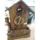 A vintage cuckoo mantle clock