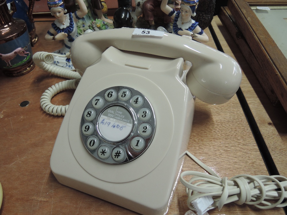 A modern push button telephone in retro style