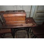 A 19th Century style treadle sewing machine and stand