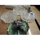 Two cut glass pin dishes, a cut glass perfume bottle and an enamel pin dish with bird decoration