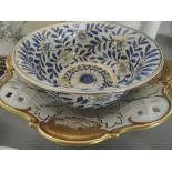 A Carstens German pottery gilt and white bowl and a blue and gilt bowl