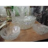 A selection of cut glass bowls, vases and dishes