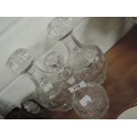 Three cut glass decanters