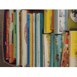 A shelf of mixed vintage childrens annuals and story books including Bedtime Stories, Fairy Tales