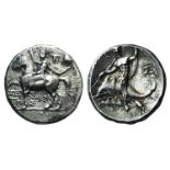 Southern Apulia, Tarentum, c. 240-228 BC. AR Nomos (20mm, 6.40g, 6h). Dioskouros, raising hand and