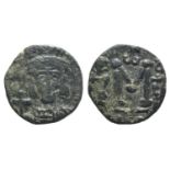 Constantine IV (668-685). Æ 40 Nummi (14mm, 2.10g, 6h). Syracuse, 668-674. Helmeted and cuirassed