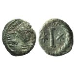 Justinian I (527-565). Æ 10 Nummi (16mm, 6.20g). Rome or Ravenna, 547-549. Helmeted and cuirassed