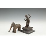AN INDIAN BRONZE MODEL OF AN ELEPHANT, 14cm long,  together with another bronze model of a dancing