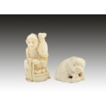 TWO JAPANESE CARVED IVORY FIGURES, one depicting a man seated with a fruit basket, 5.5cm high, the