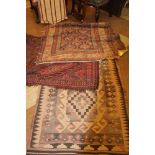 A SOUTH AMERICAN FLAT WEAVE KILIM, of rectangular from, woven with geometric designs in brown, cream