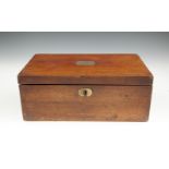 AN EARLY VICTORIAN MAHOGANY RECTANGULAR LAP-DESK, the interior well fitted and having brass