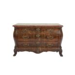 A 19TH CENTURY CONTINENTAL FRUITWOOD BOMBÉ COMMODE, the red veined marble top raised above three