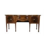 A GEORGE IV INLAID MAHOGANY SERPENTINE FRONT SIDEBOARD, with fitted drawers and cupboards, decorated