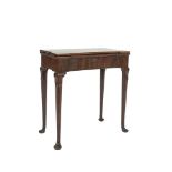 A GEORGE III MAHOGANY SHAPED RECTANGULAR FOLDING TOP GAMES TABLE, the interior fitted with green